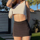 Black cargo mini skirt with a classic fabric cover