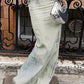 Faded long maxi denim skirt with back slit