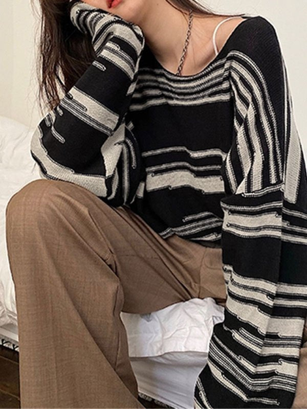 Oversized knit sweater with stripes