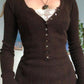 Long-sleeved knitted top with lace pattern and buttons