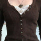 Long-sleeved knitted top with lace pattern and buttons